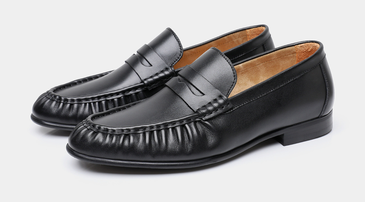 Arventti black leather penny loafers, pair